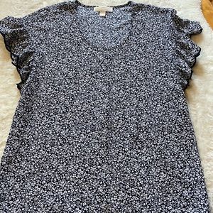 Women’s Michael kors blue and white flowered blouse. Size US M